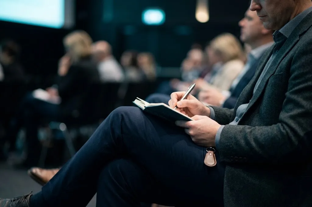 A professional taking notes during a training session